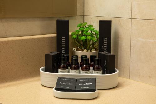 a shelf with a bunch of products on a counter at The Wings Hotels Neva Palas in Ankara