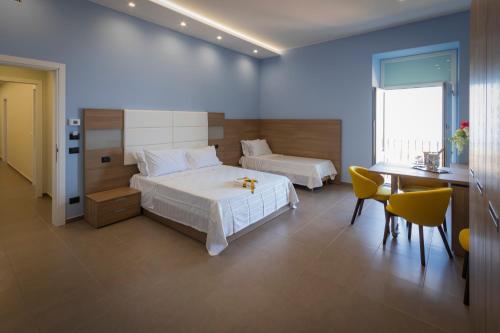 Кровать или кровати в номере Al Duomo B&B