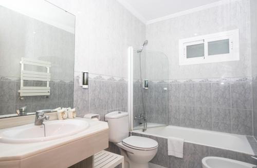 Ett badrum på NURA Apartments - Condor
