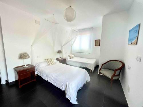 Ένα ή περισσότερα κρεβάτια σε δωμάτιο στο WONDERFUL PENTHOUSE BY THE SEA