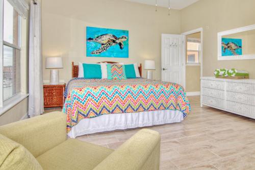 a bedroom with a bed and a couch at Madeira Bay Resort 508 in St. Pete Beach
