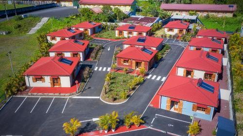 an overhead view of a house with red roofs at Le Be-Mahot - Hell Bourg in Salazie