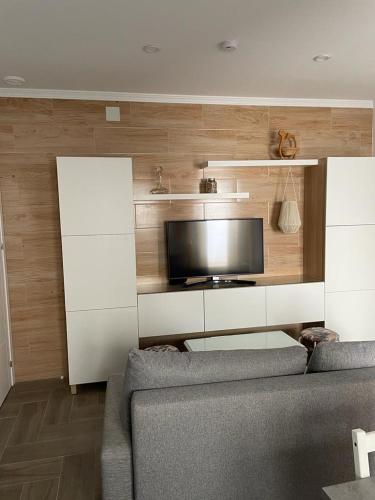 TV a/nebo společenská místnost v ubytování Casa María