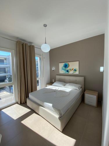 Postel nebo postele na pokoji v ubytování Starmar Hotel