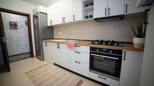 Η κουζίνα ή μικρή κουζίνα στο Ballade Apartment