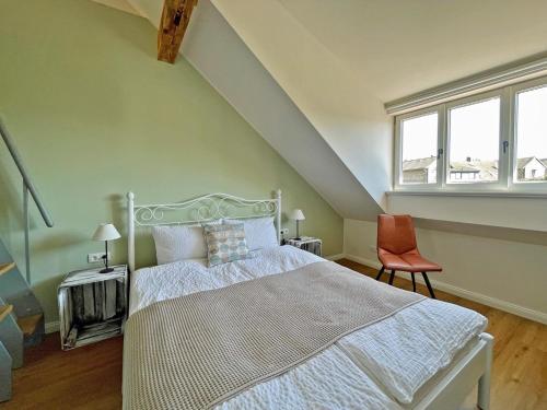 Postel nebo postele na pokoji v ubytování 1899 - Das Ferienhaus