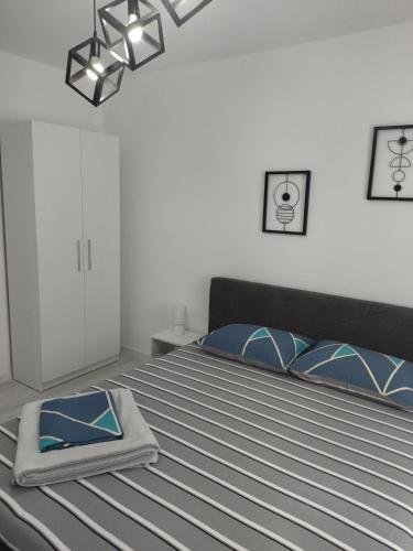 Llit o llits en una habitació de Apartament max. confort