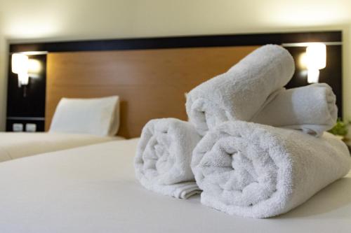 Postel nebo postele na pokoji v ubytování New Capitol Hotel - Jerusalem
