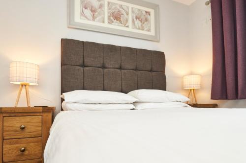 Cama o camas de una habitación en The New Inn Hotel