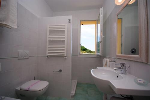 Koupelna v ubytování Hotel Dino