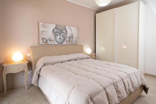 Ein Bett oder Betten in einem Zimmer der Unterkunft APARTMENT LELEGANCE - Regarda Travel