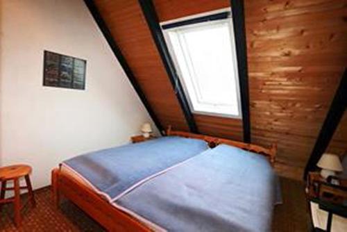Postel nebo postele na pokoji v ubytování 50021 Huus ol Diek