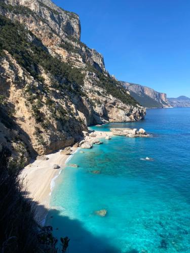a view of the beach on the amalfi coast at Casa M&M in Cala Gonone