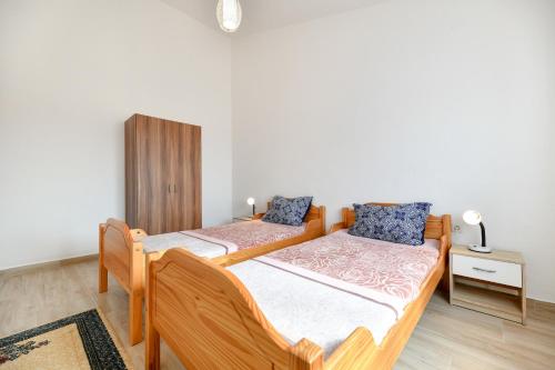 Posteľ alebo postele v izbe v ubytovaní Apartment Jaga