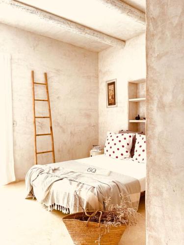 Ένα ή περισσότερα κρεβάτια σε δωμάτιο στο Casa Matelito