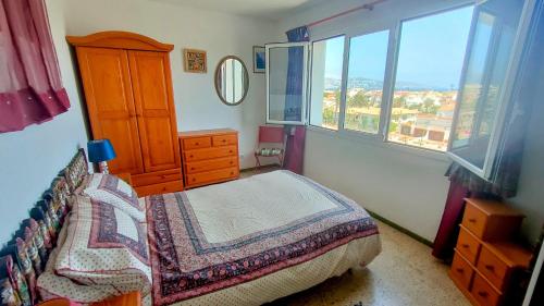 Postel nebo postele na pokoji v ubytování Summer Breeze Apartment