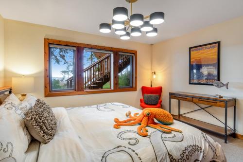 En eller flere senge i et værelse på Octopus Den