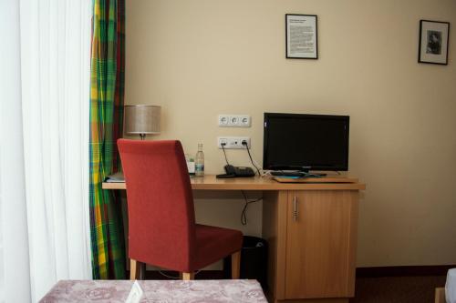 TV a/nebo společenská místnost v ubytování Hotel Erbenhof