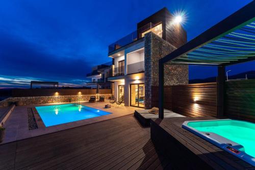 
The swimming pool at or near amara luxury villas
