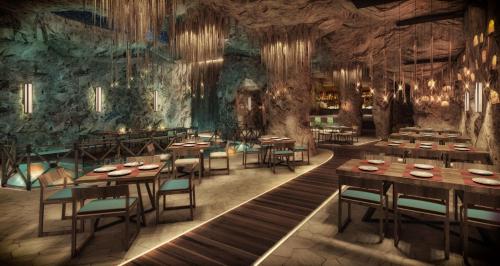 a rendering of a restaurant with tables and chairs at Royalton Splash Riviera Cancun, An Autograph Collection All-Inclusive Resort in Cancún