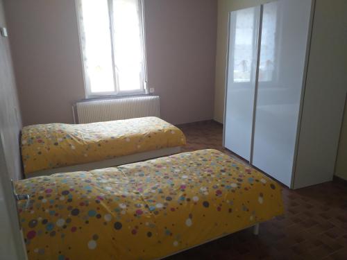 Postel nebo postele na pokoji v ubytování Gîte du Plouy