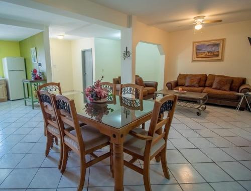 a dining room and living room with a table and chairs at Casa 12-1 - Beautiful Mountain Views (Newly Renovated - Pictures To Come!) in San Carlos