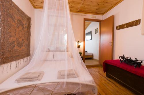 Postel nebo postele na pokoji v ubytování [kritsa house]