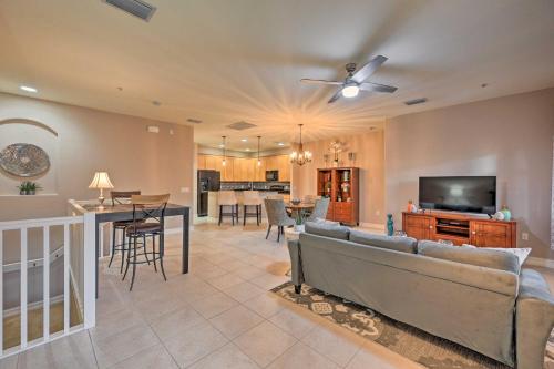 a living room with a couch and a tv at Naples Resort Townhome with Endless Amenities! in Lely Resort