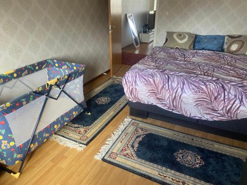 Llit o llits en una habitació de Nice and Comfortable