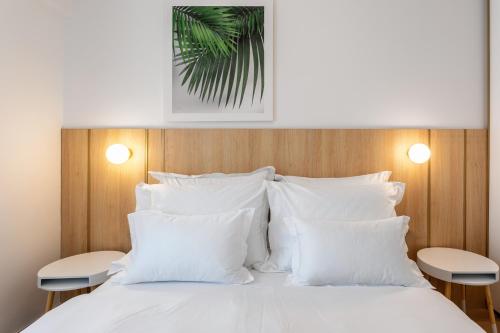 Tempat tidur dalam kamar di Adria Concept boutique apartments