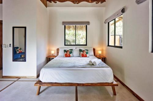 Llit o llits en una habitació de Villa Ananda