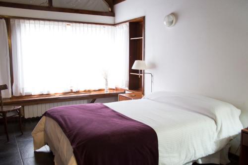 Cama o camas de una habitación en Rincón de los Andes Resort