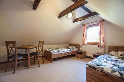 A bed or beds in a room at Bohinj Star Apartments