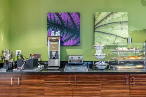 a counter top with aasteryasteryasteryasteryasteryasteryasteryasteryasteryasteryastery at MainStay Suites St Louis Airport in Bridgeton