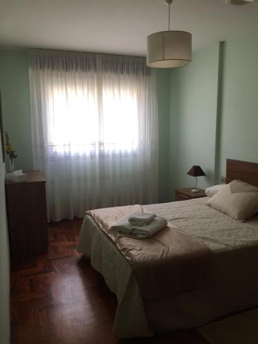 Postel nebo postele na pokoji v ubytování PASEO DO MACEIRAS