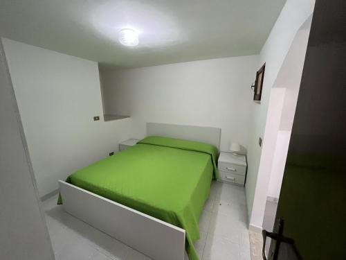 Letto o letti in una camera di Casa Vacanze Tortora