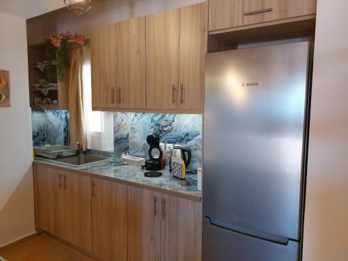 Cucina o angolo cottura di Zoi Luxurious Seaview Retreat