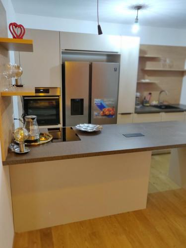 a kitchen with a counter top in a room at Vienna Top Apartment with Parking, great surroundings in Vienna