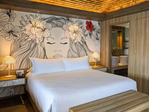 Cama o camas de una habitación en InterContinental Tahiti Resort & Spa by IHG