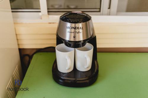 Kemudahan buat kopi dan teh di Casinha aconchegante bem perto da praia | MAAL04