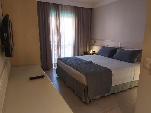 Voodi või voodid majutusasutuse Hotel Jurerê Beach Village - Apto pé na areia toas