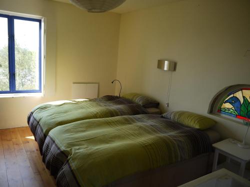 a bedroom with a bed and a window at Lookout Darling in Darling