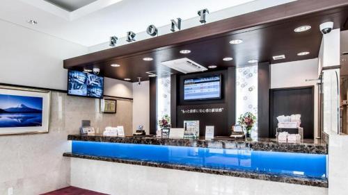 a waiting area at a hotel with a blue counter at Toyoko Inn Kintetsu Nara Ekimae in Nara