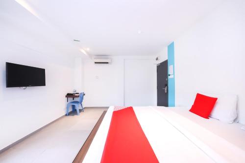 Postel nebo postele na pokoji v ubytování Hotel O Link Inn