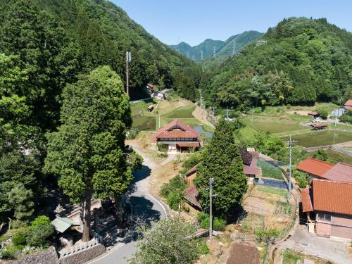 an aerial view of a small village in the mountains at 日貫一日　安田邸 in Ohnan-cho