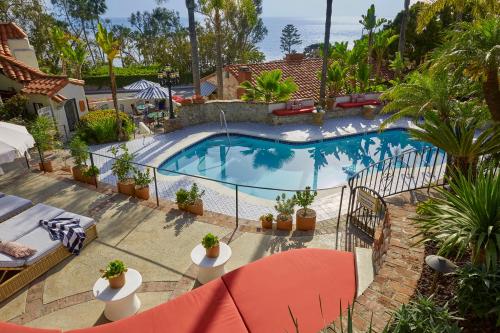 an overhead view of a swimming pool with plants at Casa Laguna Hotel & Spa in Laguna Beach