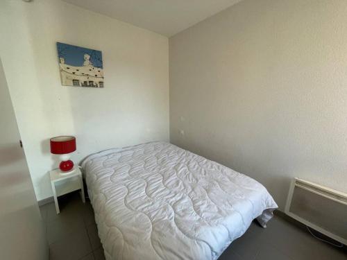 Postel nebo postele na pokoji v ubytování Appartement Argelès-sur-Mer, 2 pièces, 4 personnes - FR-1-225-732