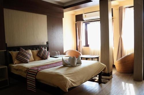 Katil atau katil-katil dalam bilik di Hotel Yala Peak