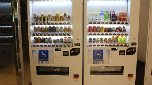 a vending machine filled with lots of bottles of soda at Toyoko Inn Osaka Honmachi No2 in Osaka