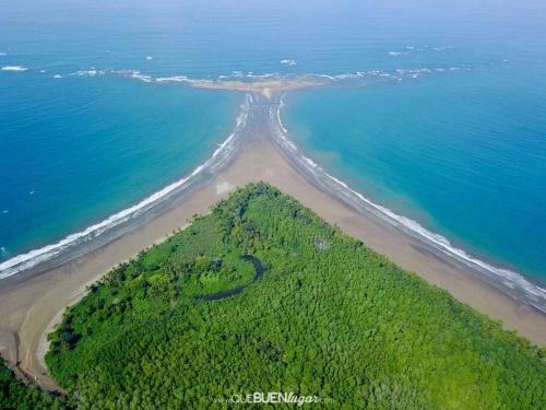 an island in the middle of the ocean at Bungalows Baobab in San Isidro